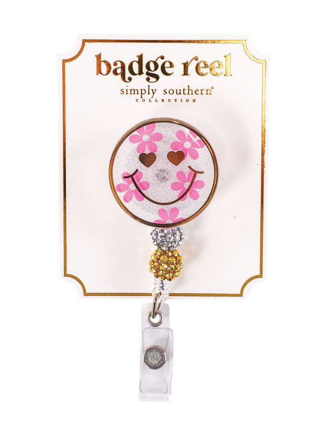 Smiley Face Pink Flower Badge Reel