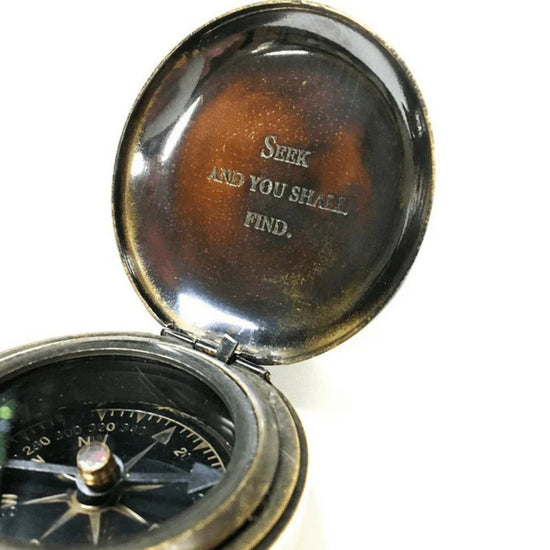 Seek and You Shall Find Push Button Compass with Leather Pouch